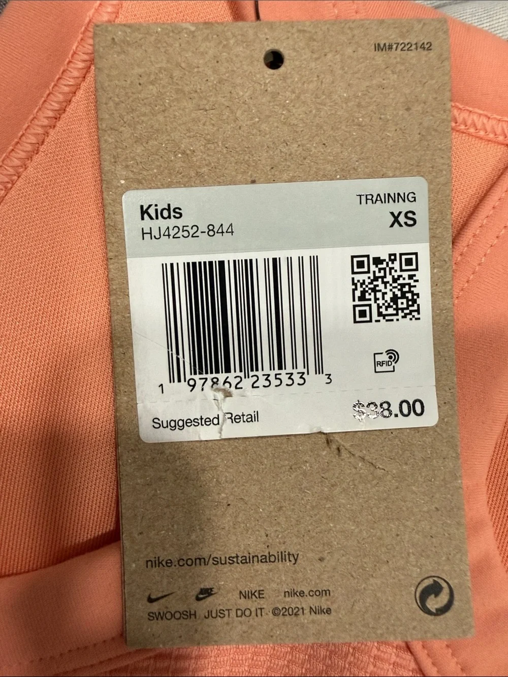 Nike Girls' Peach Racerback Tank with White Swoosh